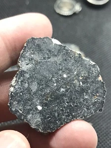 5.6g slice of NWA 17587 lunar melt breccia- dark & messy - Picture 1 of 5