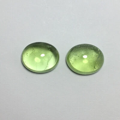 Natural green peridot oval cabochon gemstone pair good color 12.30 carat - Image 1 of 4