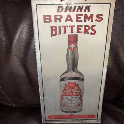 Original BRAEMS BITTERS & TONIC Aluminum ALUM SIGN Co Kenwaunee Wis Advertising - Image 1 of 4