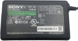 Alimentatore Caricabatterie adattatore ORIGINALE CA OEM Sony Playstation PSP-100 - Imagen 1 de 2