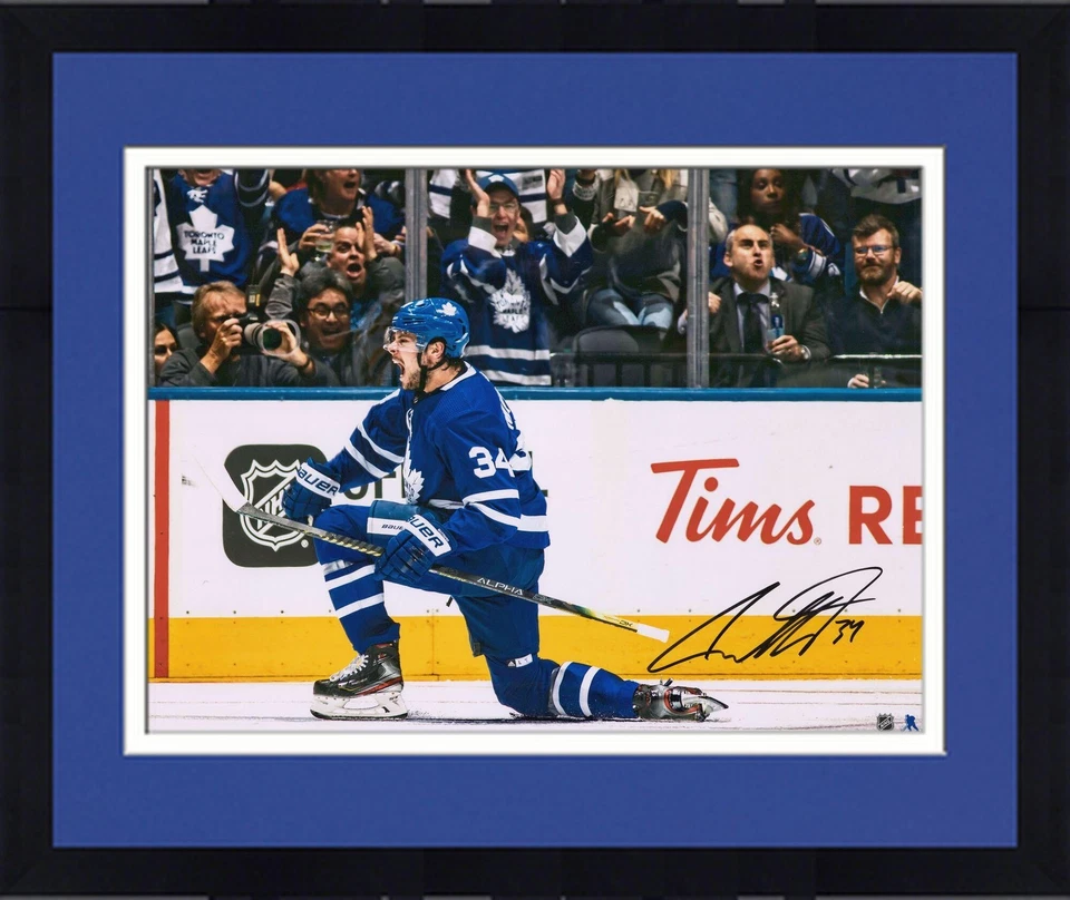 FRMD Auston Matthews Maple Leafs Signed 16x20 Blue Jersey Goal Celebration Photo - Image 1 of 1
