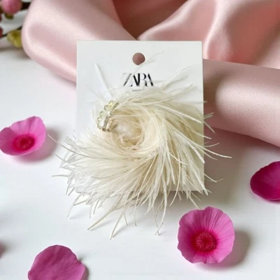 Novo com etiquetas Zara pulseira de contas de cristal ouro pena branca divertida exclusiva - Imagem 1 de 4