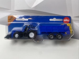 Siku 1630 New Holland with Universal Spreader 1:87 scale New Hollands TRACTORS - Picture 1 of 3