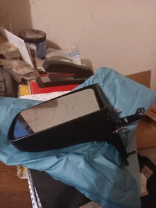 NOS 1985-1991 DEVILLE FLEETWOOD FWD LEFT POWER/HEATED REAR VIEW MIRROR 25555503 - Picture 1 of 3