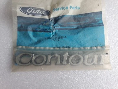 NUEVO 1995-2000 FORD CONTOUR MALETERO TAPA EMBLEMA PLACA DE IDENTIFICACIÓN F5RZ-5442528-A 1L5 Foto 1 de 3