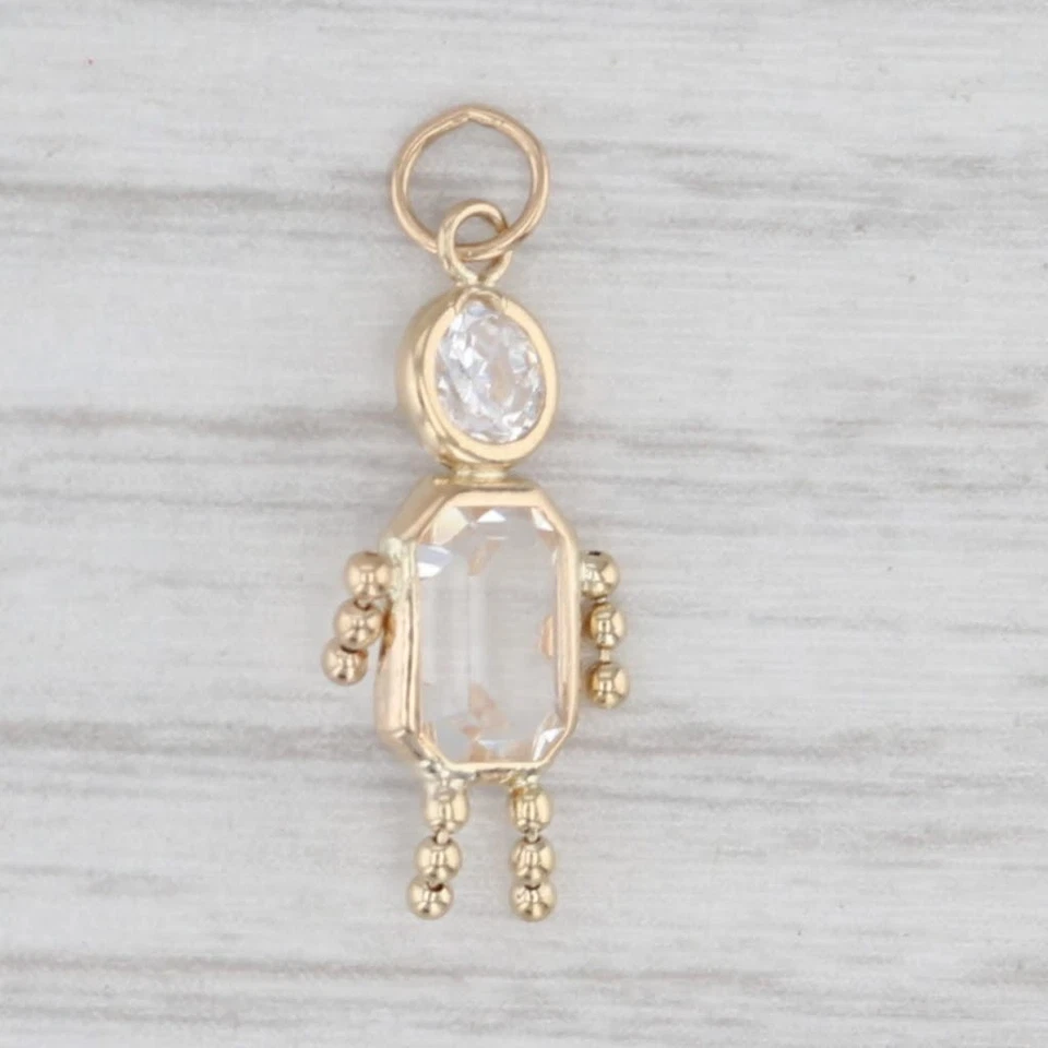 Dije de piedra de nacimiento de mayo de vidrio de circonita cúbica para niña colgante de oro amarillo de 14 k Foto 1 de 4