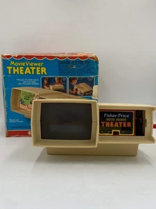 Giocattolo vintage Fisher Price Movie Viewer Teatro 1977 con 7 cartucce (NON TESTATO - Foto 1 di 22