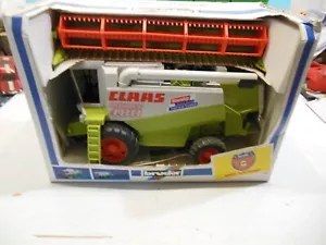 BRUDER.CLAAS LEXION 480.COMBINE HARVESTER. REMOVABLE HEADER.TRAILER. NEVER USED. - Picture 1 of 16