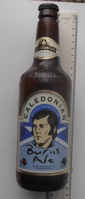 EMPTY VINTAGE 1999  CALEDONIAN BURNS ALE BOTTLE 500ml - Image 1 of 4
