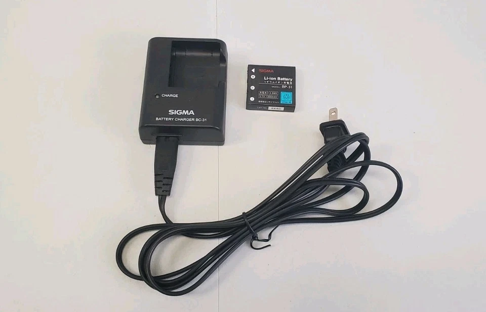 Batería y cargador Sigma BC-31 para cámaras digitales DP BC31 funciona raro Foto 1 de 4