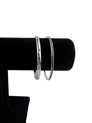 Two 8” Silver Tone Bangle Bracelets 1 With Turquoise Dots & 1 With Black Enamel - Image 1 of 4