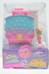 Figura en miniatura Shopkins Lil' Secrets con medallón fiesta ventanas emergentes - Imagen 1 de 1