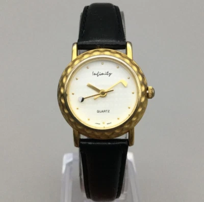 Reloj de golf Infinity para mujer 25 mm blanco con hoyuelo esfera de bola correa de cuero batería nueva Foto 1 de 4