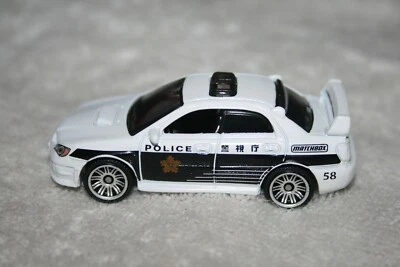 NEW MATCHBOX 💥 2007 WHITE SUBARU IMPREZA WRX POLICE  💥Chrome Wire Wheels Loose - Image 1 of 4