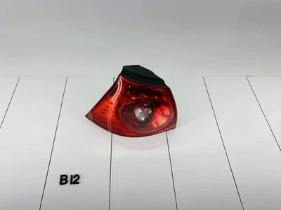 06-09 VOLKSWAGEN GTI LUZ TRASERA IZQUIERDA LADO DEL CONDUCTOR EXTERIOR LUZ DE FRENO OEM Foto 1 de 4