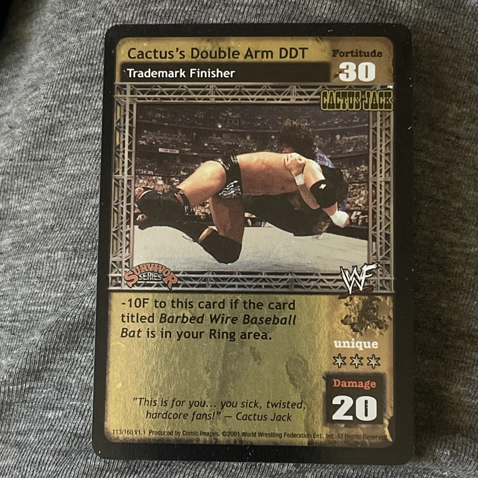 WWE WWF Raw Deal CCG - Cactus's Double Arm DDT - Ultra Rare Survivor Series 1 - Image 1 of 4