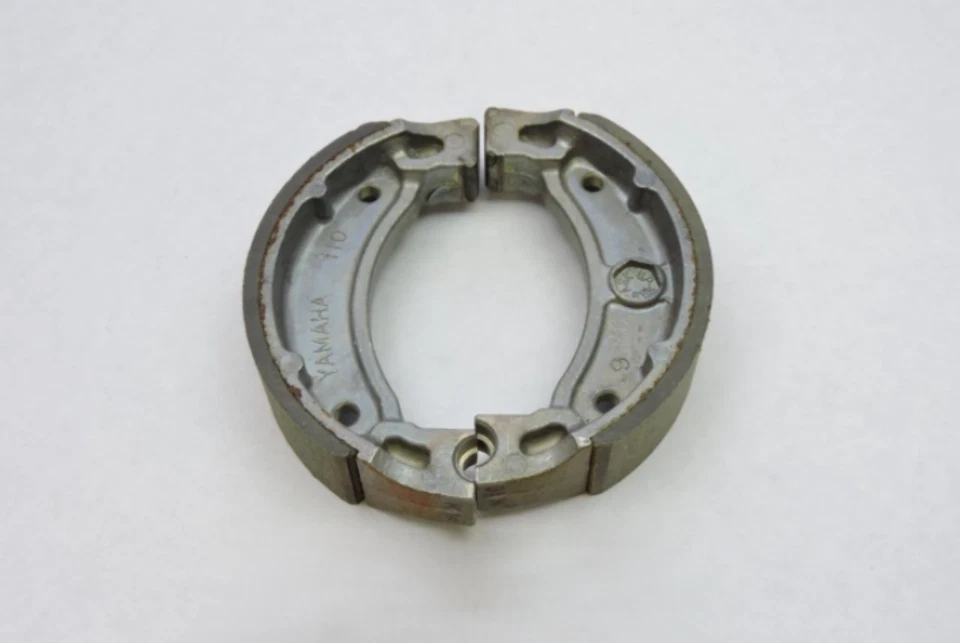 Juego de zapatas de freno Yamaha GT80G 1980 OEM 2JL-W2536-10 Foto 1 de 1