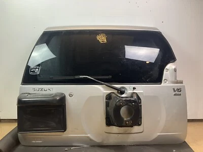 Suzuki Grand Vitara 2003 puerta trasera plateada Foto 1 de 4
