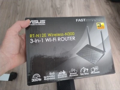 Wifi Router Asus RT-N12E Wireless-N300 3-in-1 Repeater Wi-Fi  - Bild 1 von 4