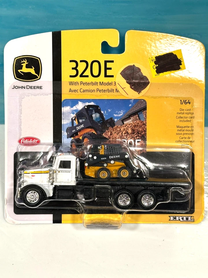 Camión John Deere ERTL 320E Bobcat con plataforma plana Peterbilt modelo 367 1:64 Foto 1 de 1