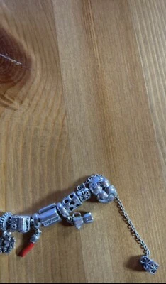 BRACCIALE ORIGINALE PANDORA COMPLETO 26 CHARMS DISTANZIATORI PENDENTI FUORI CAT. - Immagine 1 di 4