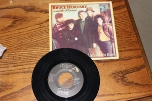 VINYL 45 BY BRUCE HORNSBY MANDOLIN RAIN B/W THE RED PLAINS P/S UNPLAYED - Picture 1 of 2