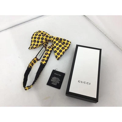 Pajarita GUCCI amarilla usada Foto 1 de 4