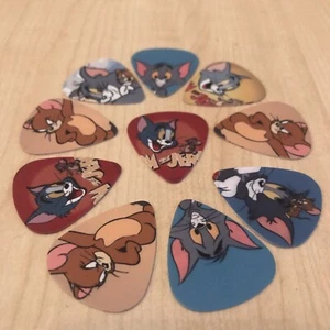 TOM & JERRY PLETTRI CHITARRA 10 FOTO BAMBINI BAMBINI BAMBINI MUSICA REGALO - Foto 1 di 10