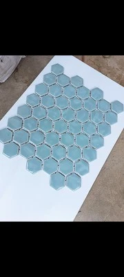 1 sheet of baby blue hexagon mosaic tile..glossy undulated..11 x 10 Daltile  - Image 1 of 2