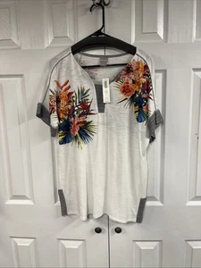 NUEVO CON ETIQUETAS Chicos talla 1= camiseta mediana a rayas florales, manga corta - Imagen 1 de 5