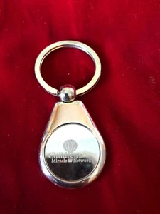 Childrens Miracle Network Silver Tone Engraved Logo Teardrop Keyring Fob Vtg - Picture 1 of 3
