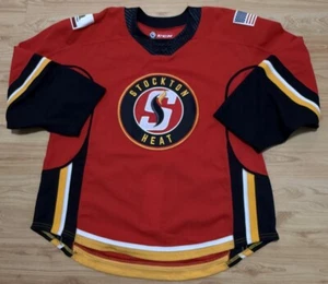 CCM AUTHENTIC AHL STOCKTON HEAT HOCKEY JERSEY SZ 56 FIGHT STRAP CANADA EUC - Bild 1 von 11