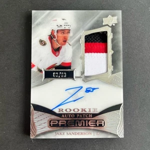 2022-23 Upper Deck Premier Acetate Rookie Auto Patch Jake Sanderson /99 Senators - Picture 1 of 2