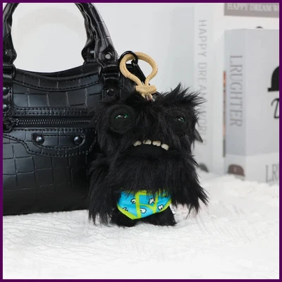 Fuggler Muñecas de Peluche Suave Llavero Sonrisa Fea Dientes Monstruo Colgante Fugg Ojos Anchos Foto 1 de 4