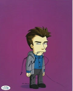 DANIEL RADCLIFFE SIGNED SIMPSONS PHOTO ALSO ACOA CERTIFIED - Picture 1 of 2