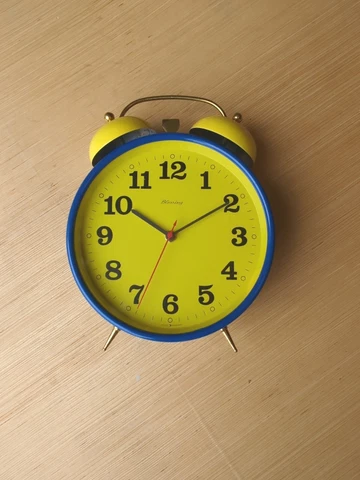 Vintage oversized 1980s quartz alarm clock, painted metal Blessing West Germany Cover