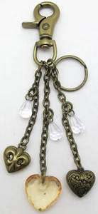 NUOVO KATHY VAN ZEELAND mix cuori/cristallo borsa ciondolo portachiavi/fob oro antico - Foto 1 di 3