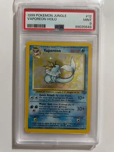1999 Vaporeon 12/64 Jungle Holo PSA 9 - Picture 1 of 3