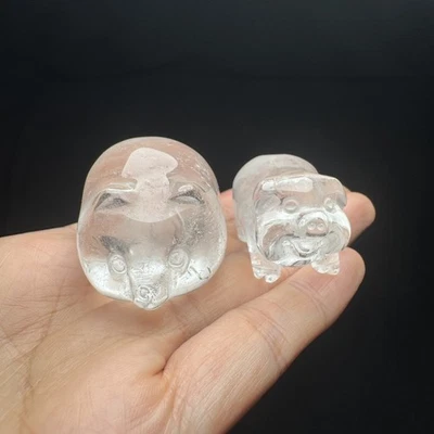 A pair of Hand-Carved Piglets from High-Clarity Natural Quartz Crystal-27 - Image 1 of 4
