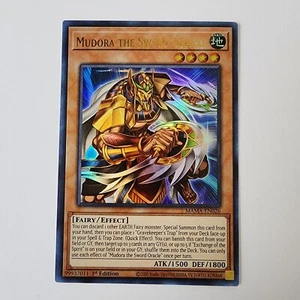 Mudora the Sword Oracle - MAMA-EN026 - Casi nuevo - Ultra raro - 1ª edición - Yugioh - Imagen 1 de 2