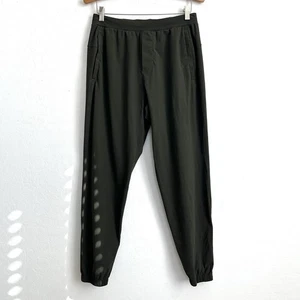 Pantalones Lululemon Hombres Medio Surge Jogger Tobillo Cremallera Elastizados Correr Fatiga Verde - Imagen 1 de 11
