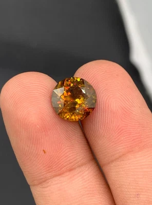 Deslumbrante esfena ardiente de Pakistán, que pesa 4,70 quilates piedras preciosas sueltas Foto 1 de 4