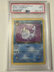 Pokemon PSA 9 Dark Vaporeon 1° Edizione 45/82 Team Rocket Regolare - Foto 1 di 2