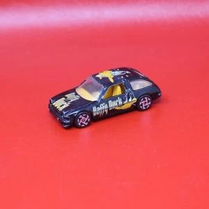 1999 Racing Champions Street Wheels: Looney Tunes Daffy Duck Black 1:64 Loose - Picture 1 of 4