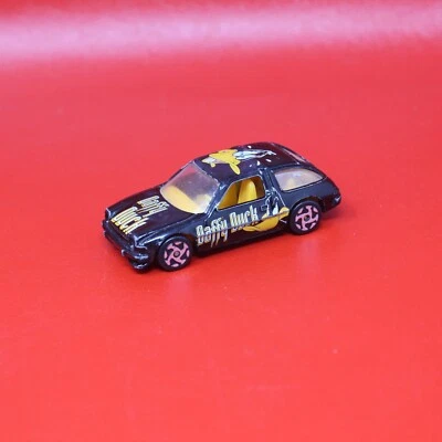 Racing Champions Street Wheels 1999: Looney Tunes Pato Lucas negro 1:64 suelto Foto 1 de 4