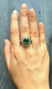 Anello di fidanzamento in oro bianco 14 kt con smeraldo verde taglio ovale... - Bild 1 von 5