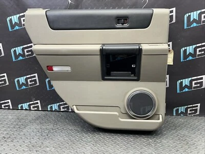 OEM 2003-2007 Hummer H2 conductor izquierdo puerta trasera panel luz trigo Foto 1 de 4