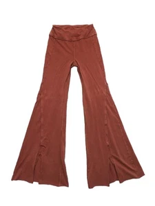 Free People Movement Hot Shot Kick Flares XS Orange Rust Split Front - Imagen 1 de 8