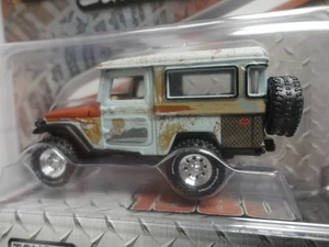 Johnny Lightning 1980 TOYOTA LAND CRUISER Project Car '80 MiJo Excl 1/4800 - Bild 1 von 3