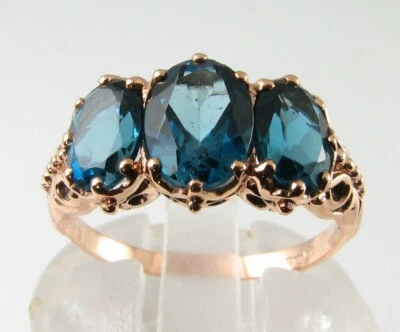 ANILLO ART DECO INS ORO ROSA 9K 9CT LONDRES TOPACIO AZUL TRILOGÍA 3 PIEDRAS 3.60ct Talla O Foto 1 de 4